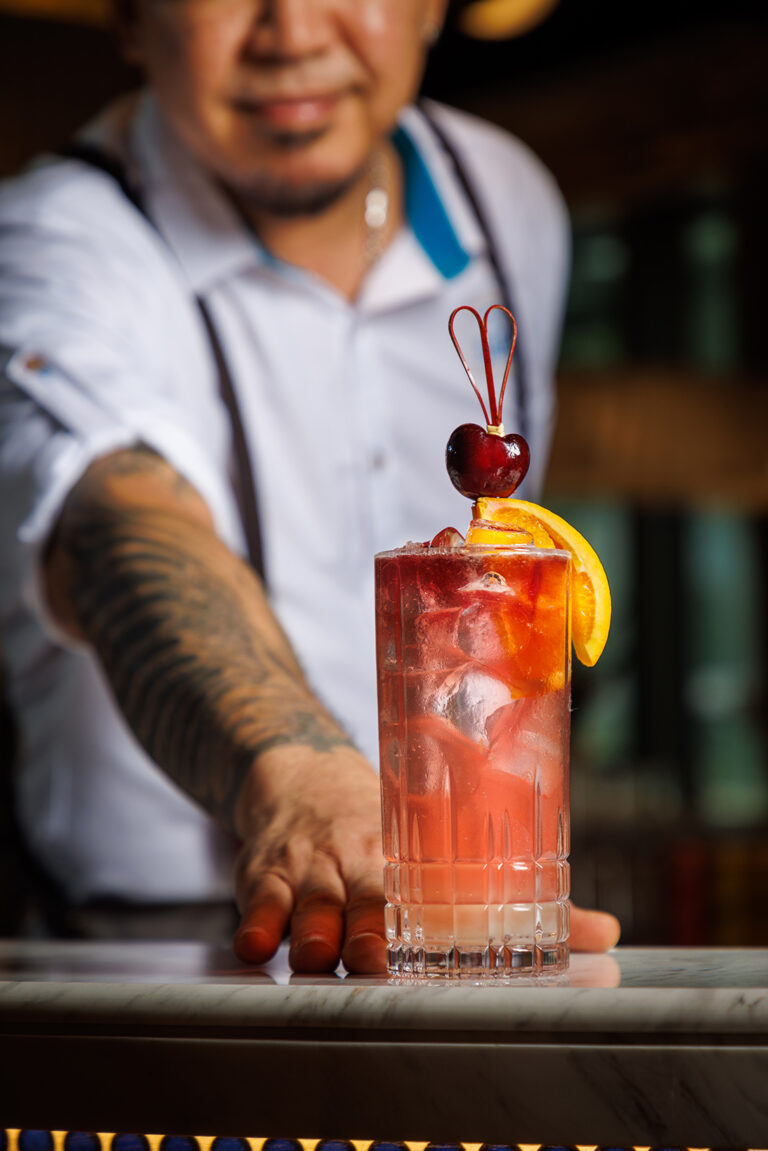 Bar tender with drinks 3